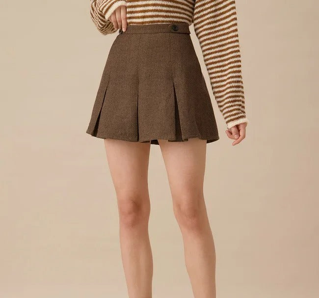 Jupe mini marron plissée avec texture tissée