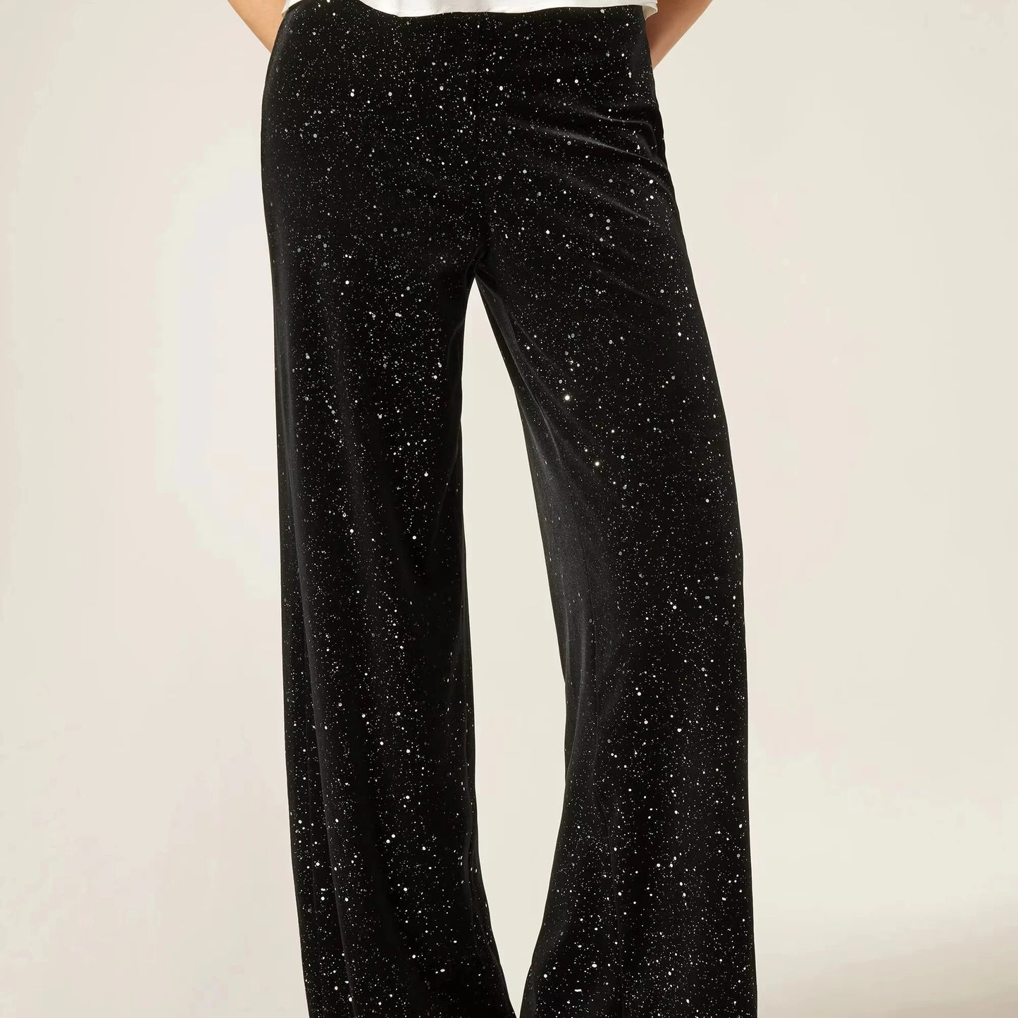 Pantalon noir à jambe droite avec motif moucheté sur toute la surface